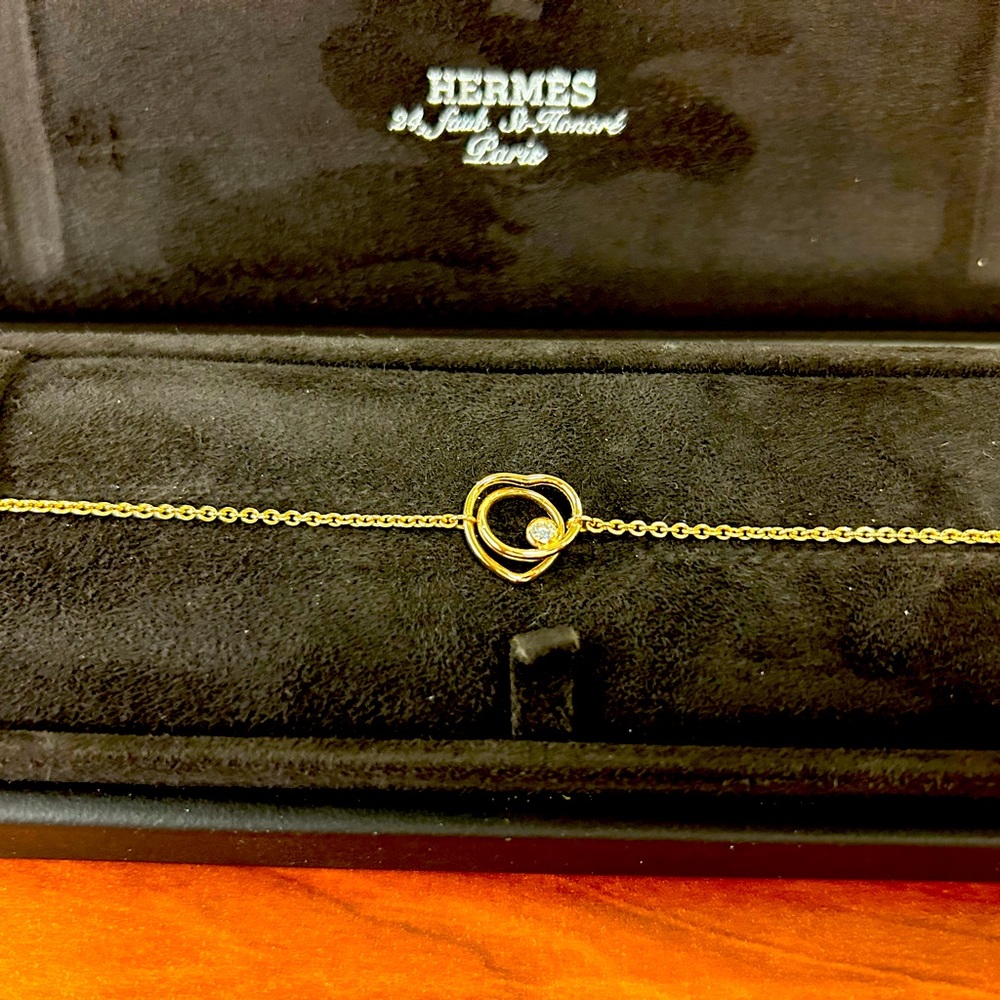 Never worn Rose Gold Hermes bracelet. Original packaging.